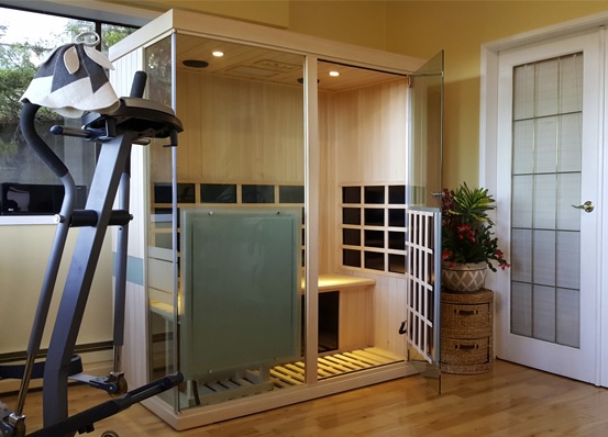Home gym with 3 person infrared sauna